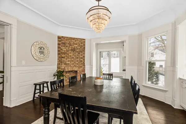 a kitchen with granite countertop cabinets and stove top oven