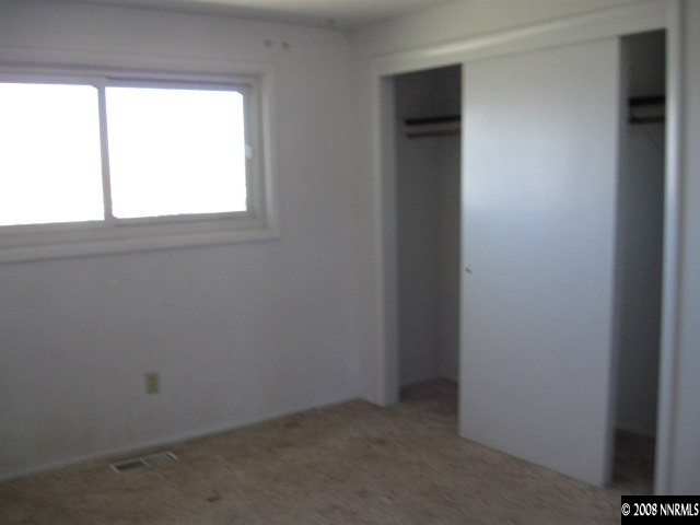 126 Bernoulli Street Reno, NV 89506 - Photo 3 of 5 a view of an empty room with a window