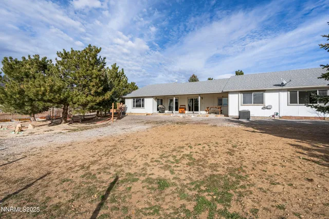 a house with yard in front of it
