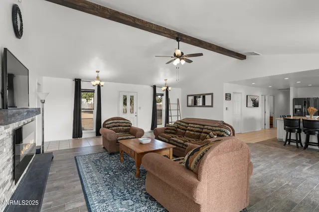 a bedroom with furniture and a fireplace