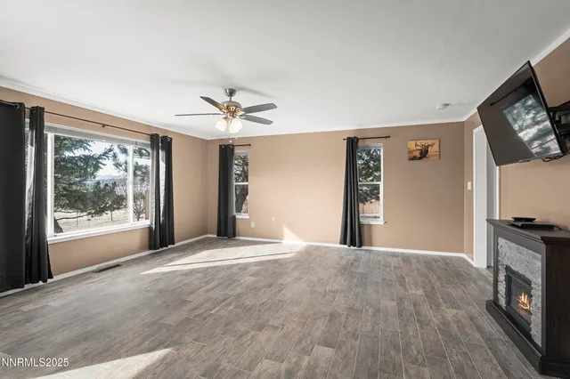a view of a livingroom with a flat screen tv