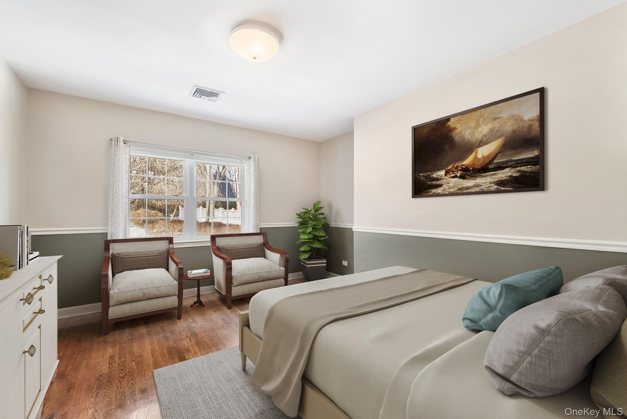 100 Yale Road Hartsdale, NY 10530 - Photo 21 of 42 a bedroom with a bed and a couch
