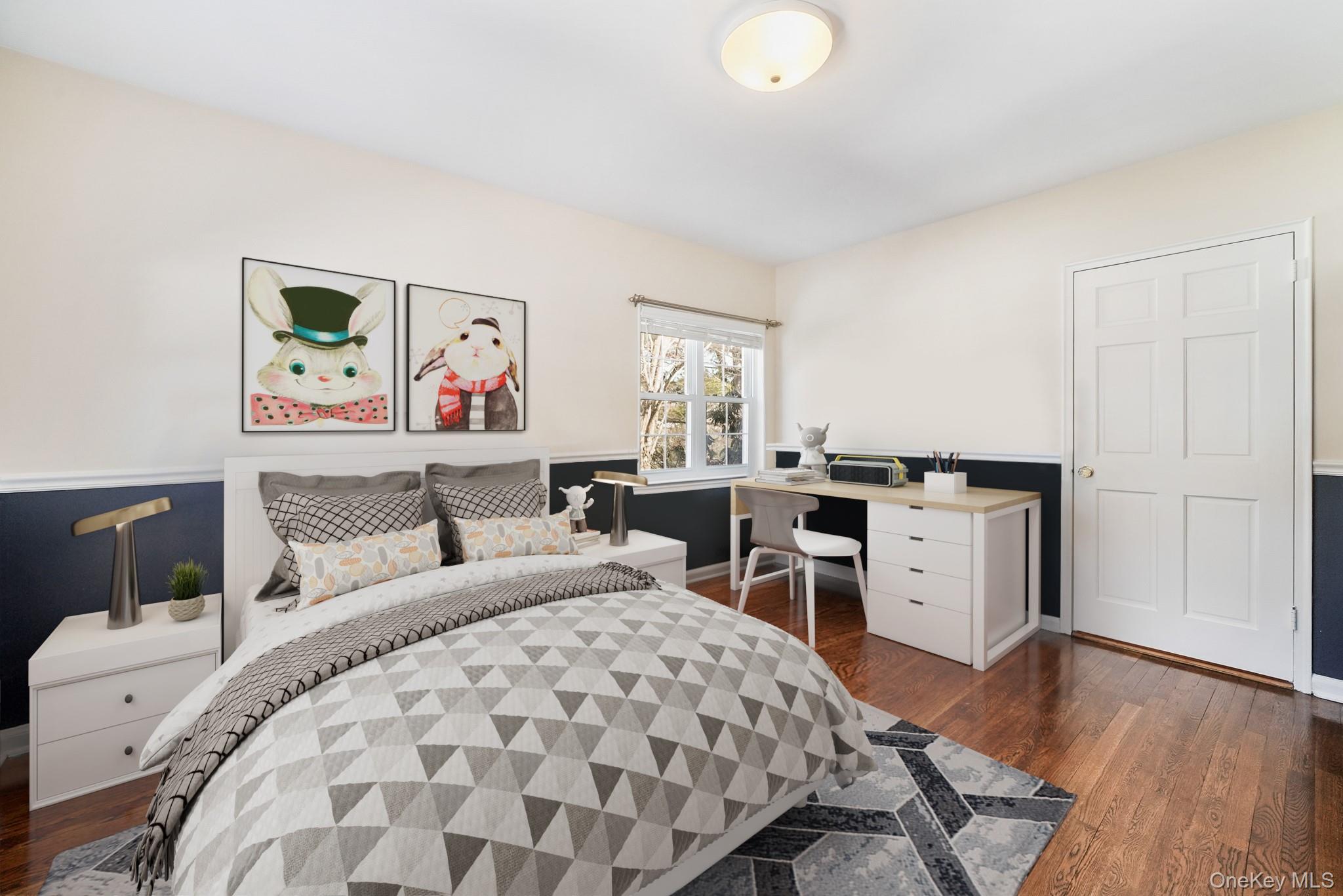 100 Yale Road Hartsdale, NY 10530 - Photo 23 of 42 a bedroom with a bed and wooden floor