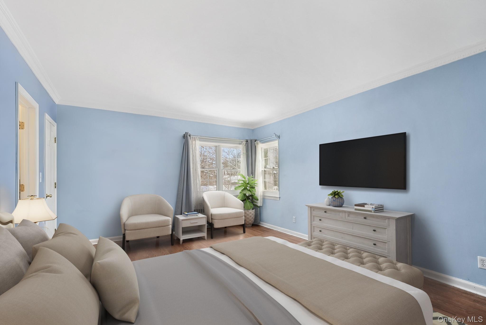 100 Yale Road Hartsdale, NY 10530 - Photo 26 of 42 a bedroom with furniture and a flat screen tv