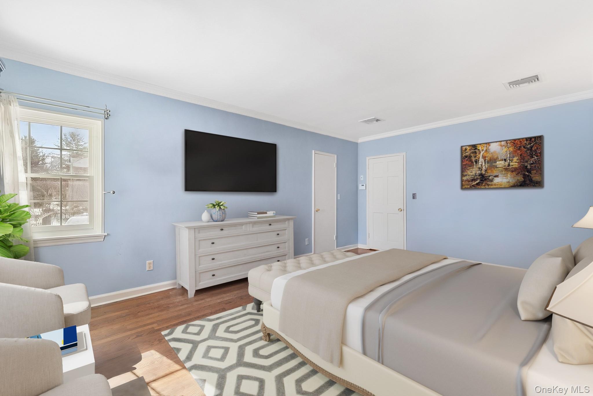 100 Yale Road Hartsdale, NY 10530 - Photo 28 of 42 a bedroom with a bed and a flat screen tv