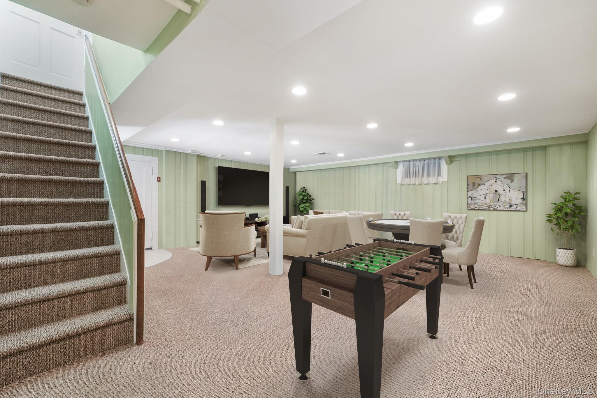 100 Yale Road Hartsdale, NY 10530 - Photo 31 of 42 a living room with furniture a flat screen tv and kitchen view