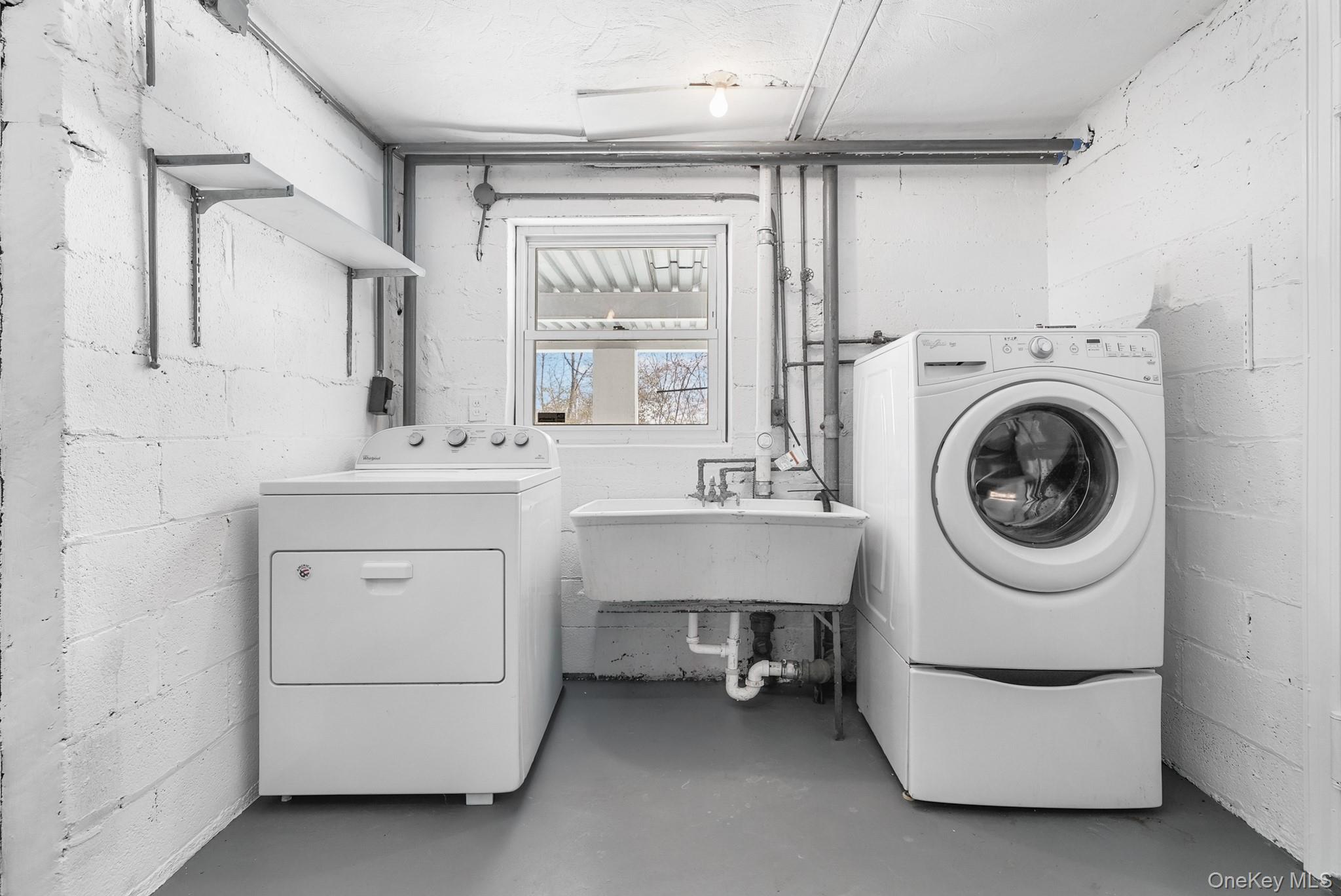 100 Yale Road Hartsdale, NY 10530 - Photo 34 of 42 a utility room with sink dryer and washer