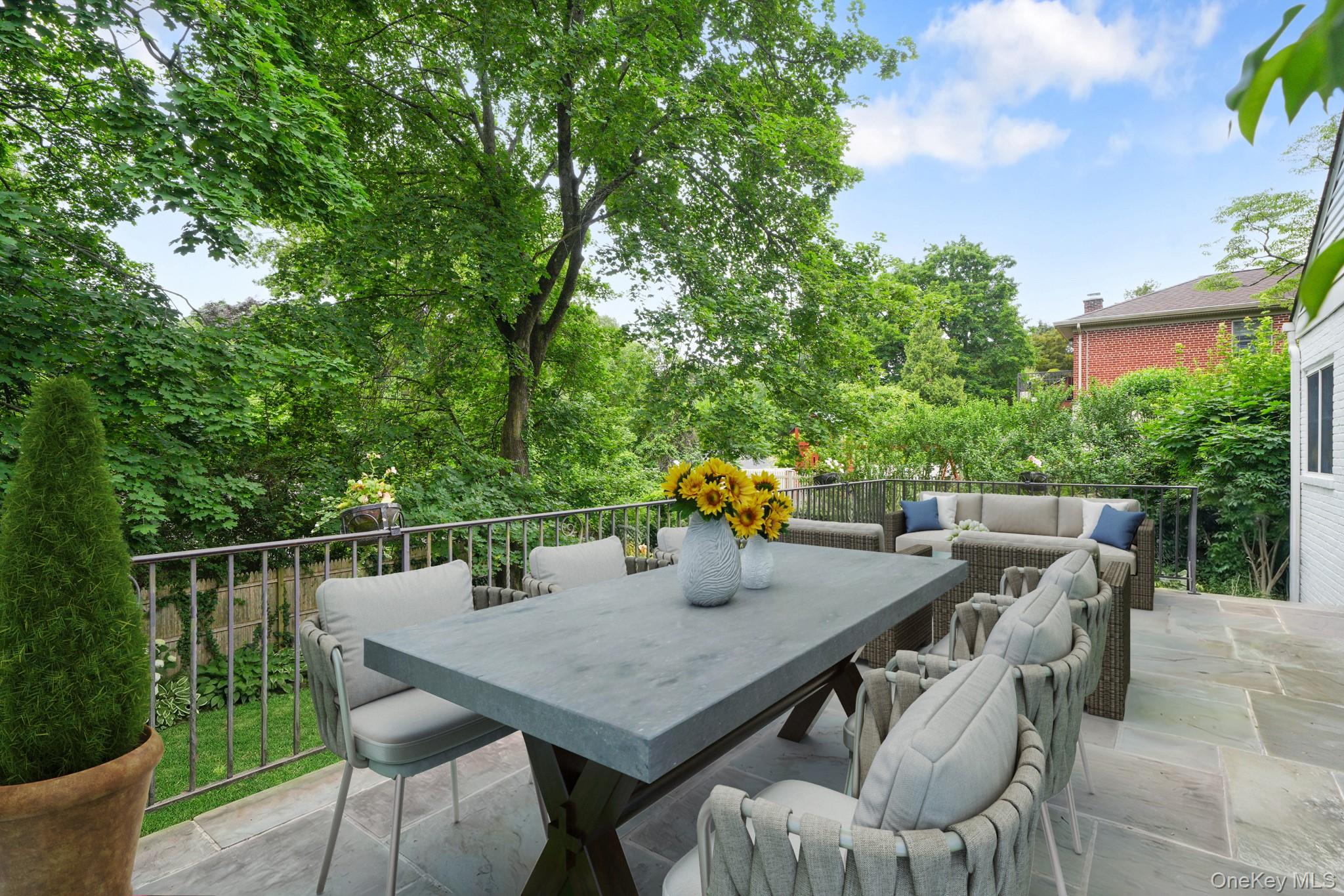 100 Yale Road Hartsdale, NY 10530 - Photo 37 of 42 a view of an outside dining space with furniture