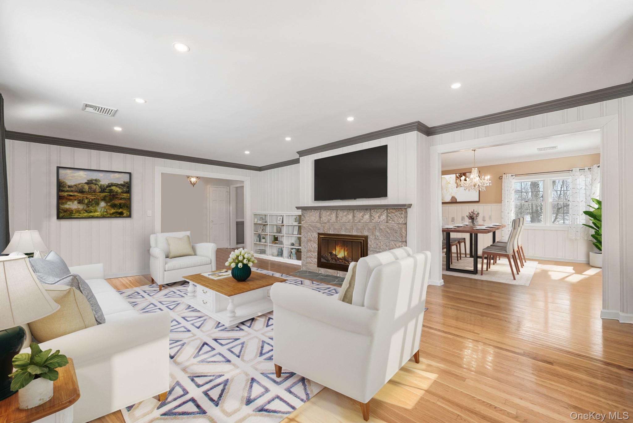 100 Yale Road Hartsdale, NY 10530 - Photo 10 of 42 a living room with furniture a fireplace and a flat screen tv