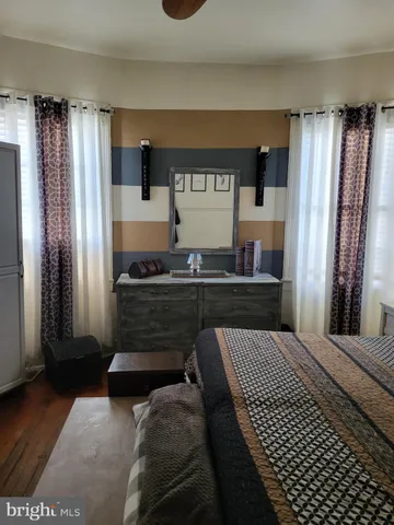 a living room with a couch and a table