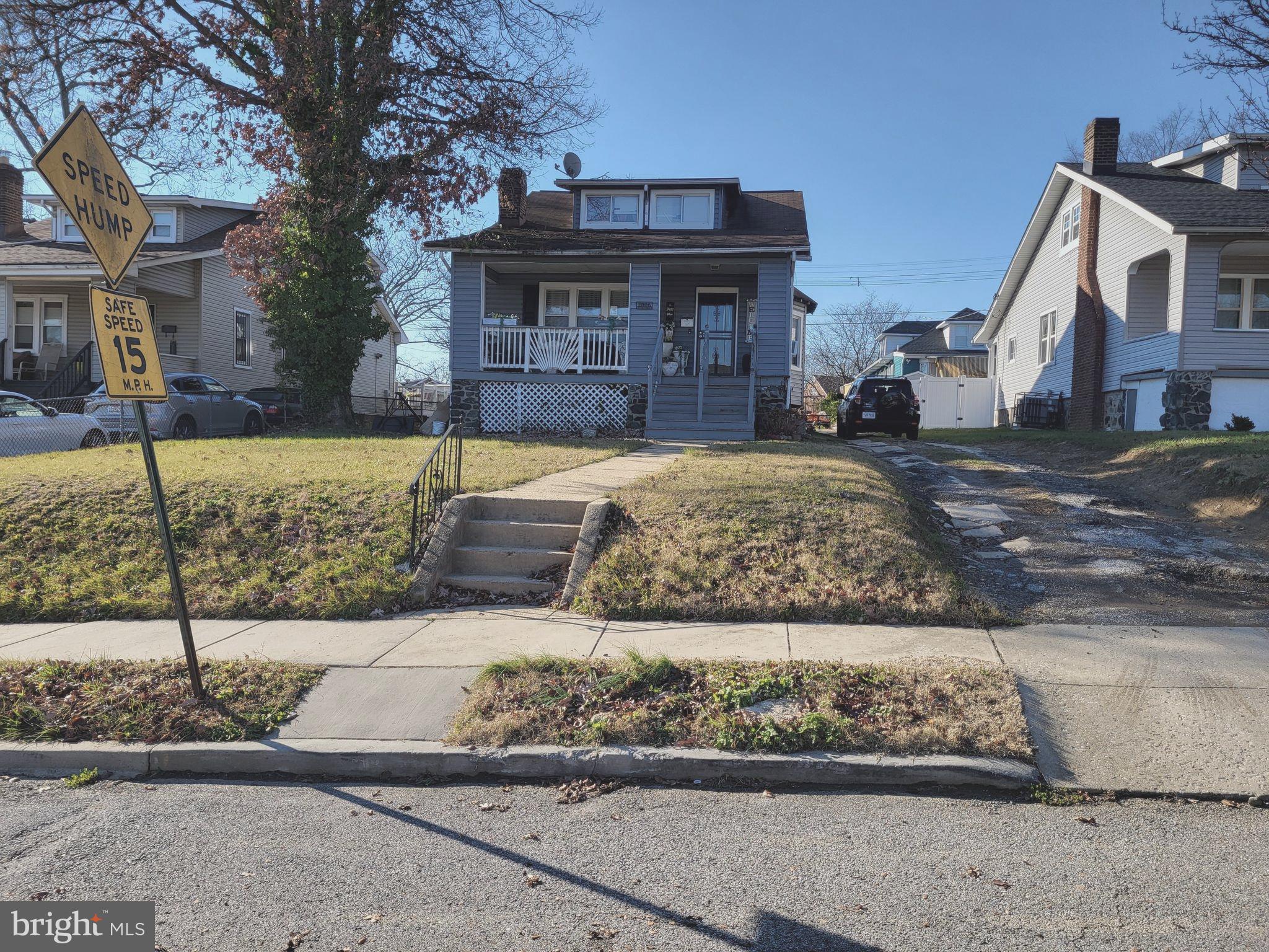 2806 Chelsea Terrace Baltimore, MD 21216 - Photo 2 of 36 a front view of a house with garage