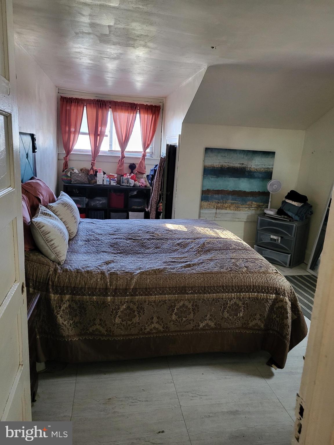 2806 Chelsea Terrace Baltimore, MD 21216 - Photo 26 of 36 a bedroom with a bed window and dresser