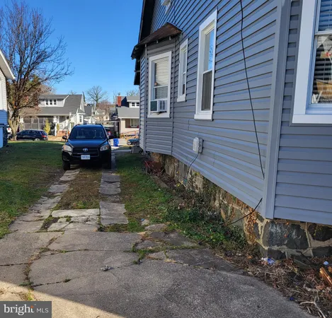 a view of a house with a back yard