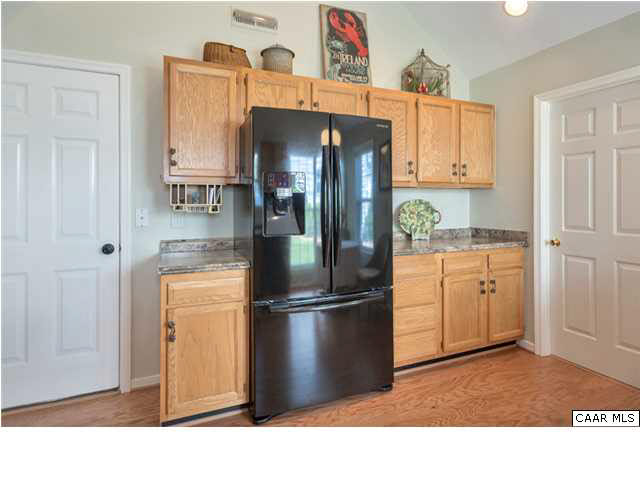 976 Devon Spring Court Charlottesville, VA 22903 - Photo 14 of 33 The new appliances include this french door counter-depth refrigerator with three years remaining on the warranty.