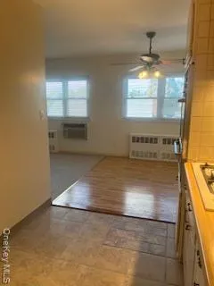 a view of a kitchen with a sink
