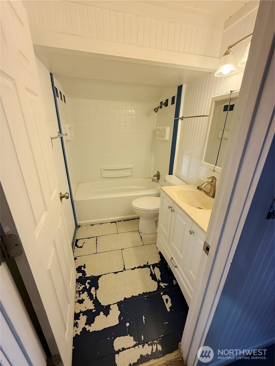 550 E Trail Belfair, WA 98528 - Photo 8 of 11 a bathroom with a sink and a mirror