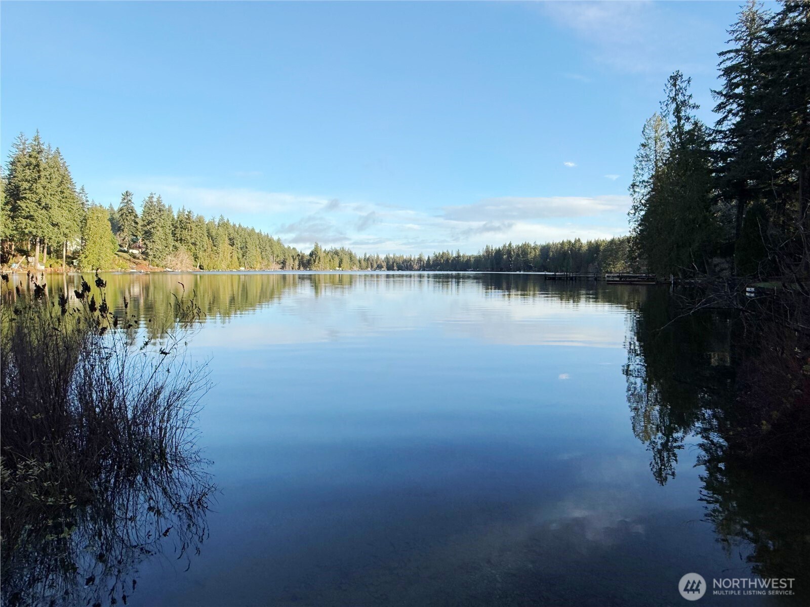 550 E Trail Belfair, WA 98528 - Photo 10 of 11 a view of a lake with a city