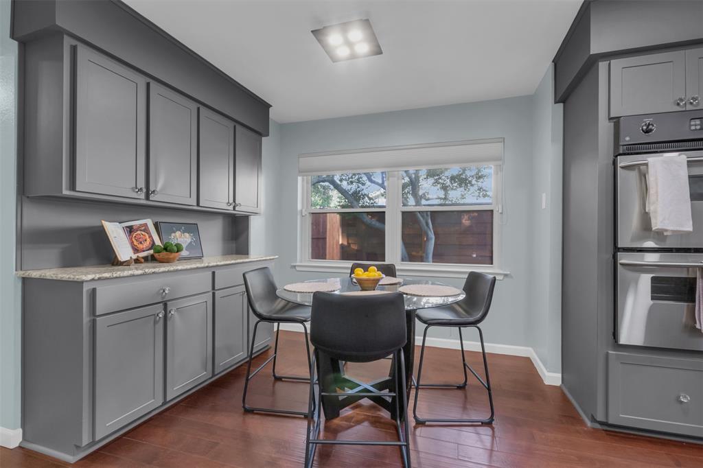 4808 Thunder Road Dallas, TX 75244 - Photo 15 of 36 a work place with cabinets and wooden floor