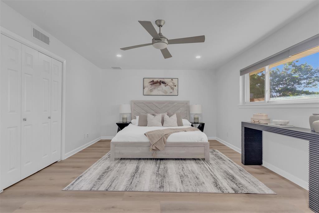 4808 Thunder Road Dallas, TX 75244 - Photo 36 of 36 a bed room with a bed and a painting