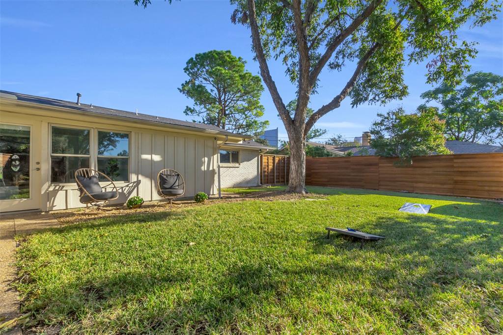 4808 Thunder Road Dallas, TX 75244 - Photo 5 of 36 a view of a house with backyard and sitting area