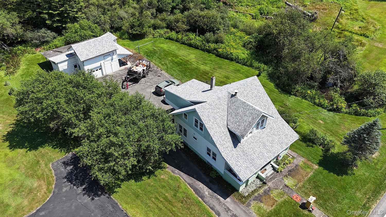 1779 Shandelee Road Livingston Manor, NY 12758 - Photo 2 of 31 Showing the home and carriage house from overhead.