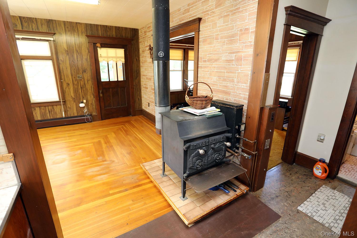 1779 Shandelee Road Livingston Manor, NY 12758 - Photo 7 of 31 Woodstove in LR, throwing heat all downstairs