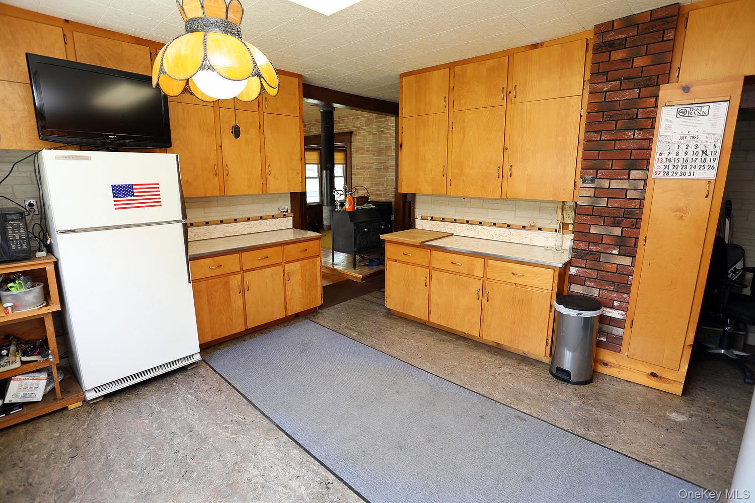 1779 Shandelee Road Livingston Manor, NY 12758 - Photo 9 of 31 Kitchen. Lots of cabinet and counter space. LP gas stove.