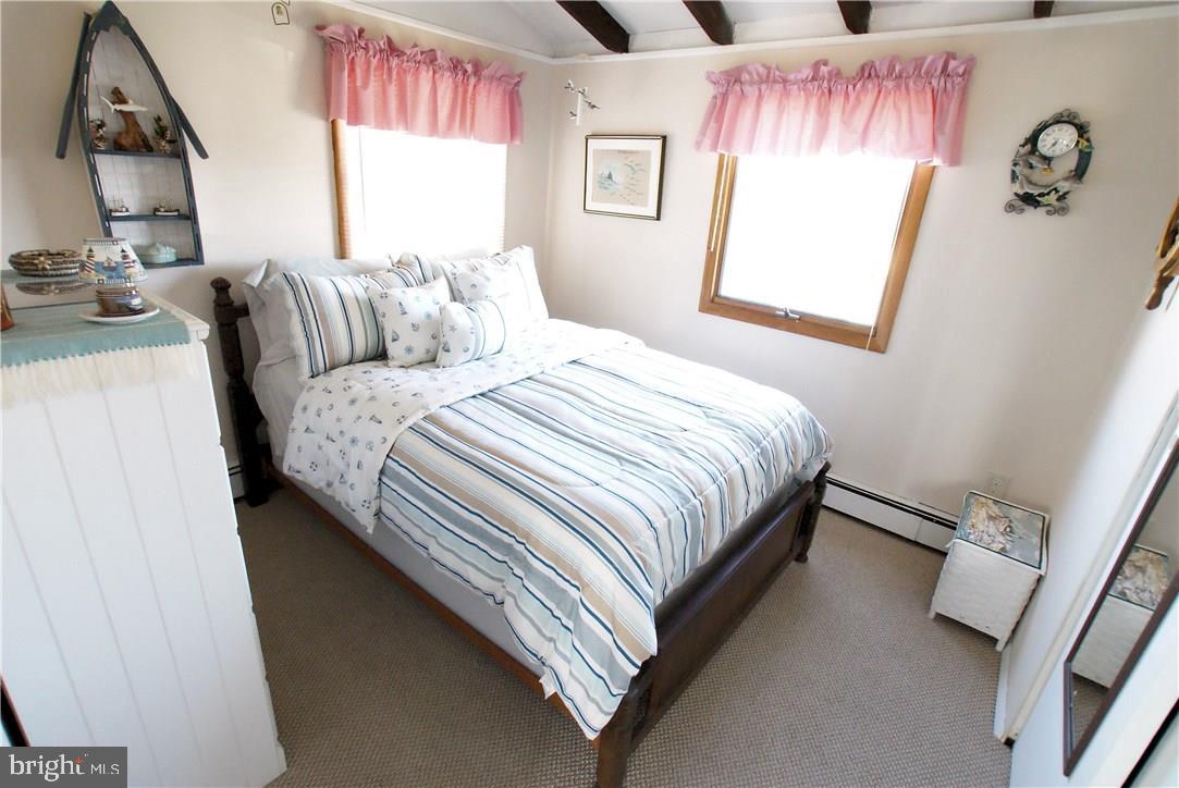 405 Kingfisher Road Tuckerton, NJ 08087 - Photo 12 of 16 a bedroom with a bed and window