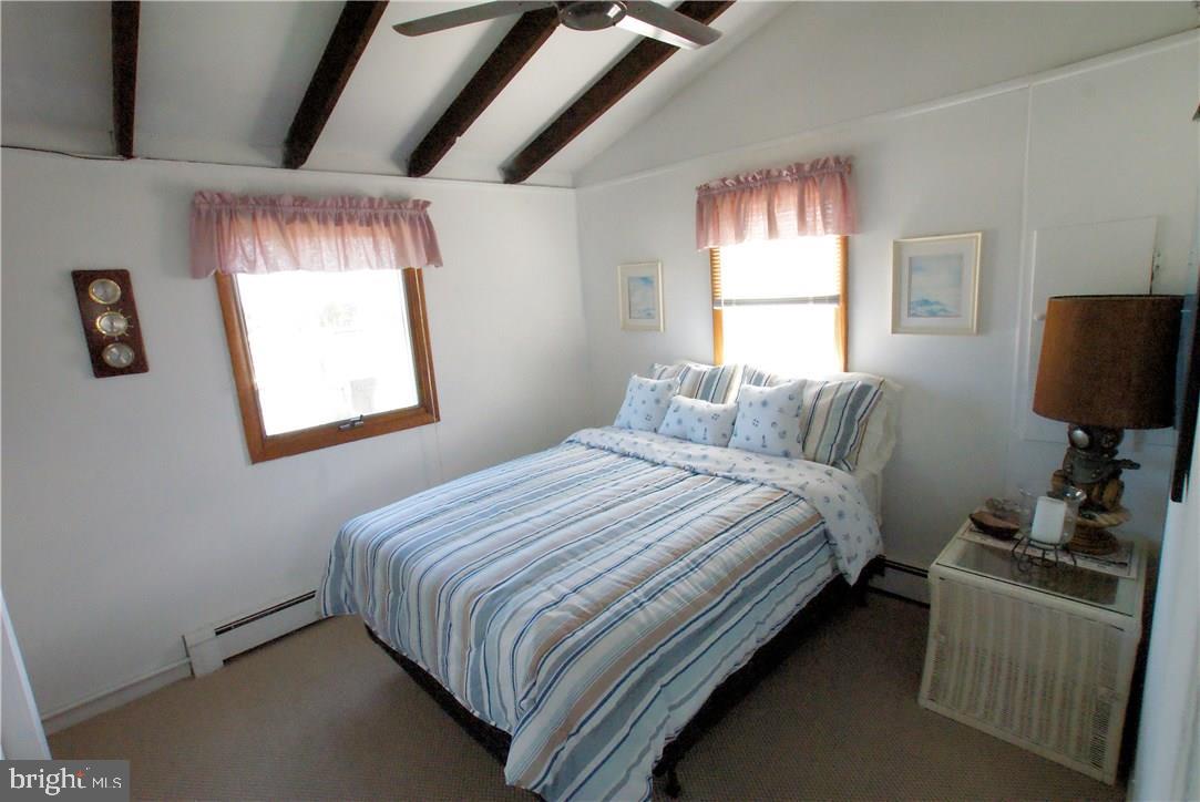 405 Kingfisher Road Tuckerton, NJ 08087 - Photo 13 of 16 a bedroom with a bed and window