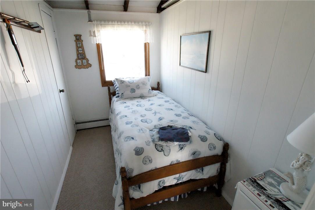 405 Kingfisher Road Tuckerton, NJ 08087 - Photo 14 of 16 a bedroom with a bed and a window in it