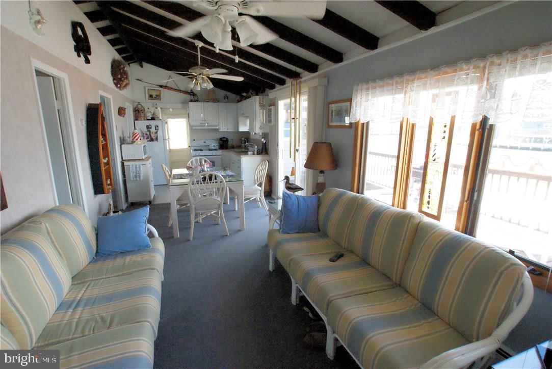 405 Kingfisher Road Tuckerton, NJ 08087 - Photo 9 of 16 a living room with furniture and a large window