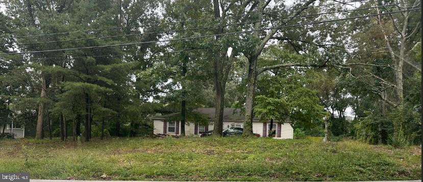 231 Obrecht Road Millersville, MD 21108 - Photo 1 of 1 a backyard of a house with lots of green space