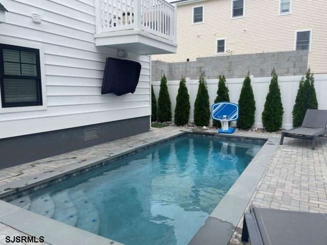 103 North Monroe Avenue, Unit MAY 15TH 2026JULY 31ST 2026 Margate City, NJ 08402 - Photo 15 of 33 a view of a balcony with chairs