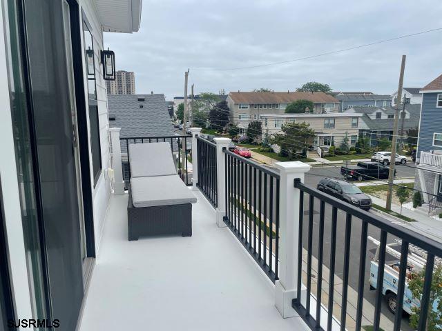 103 North Monroe Avenue, Unit MAY 15TH 2026JULY 31ST 2026 Margate City, NJ 08402 - Photo 22 of 33 a view of a balcony with city view