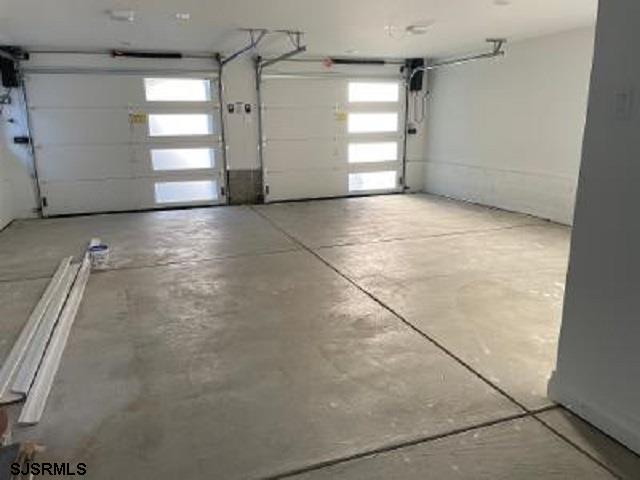 103 North Monroe Avenue, Unit MAY 15TH 2026JULY 31ST 2026 Margate City, NJ 08402 - Photo 32 of 33 a view of a garage