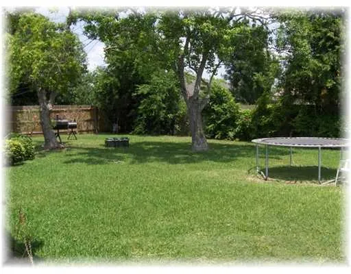 a view of a golf course with a lake