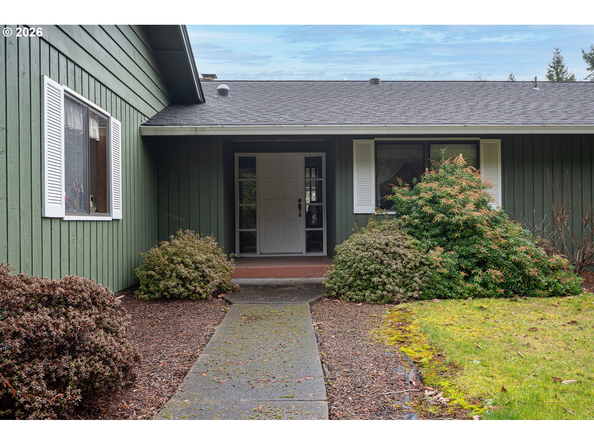 76382 Delena Mayger Road Rainier, OR 97048 - Photo 23 of 36 a front view of a house with a yard
