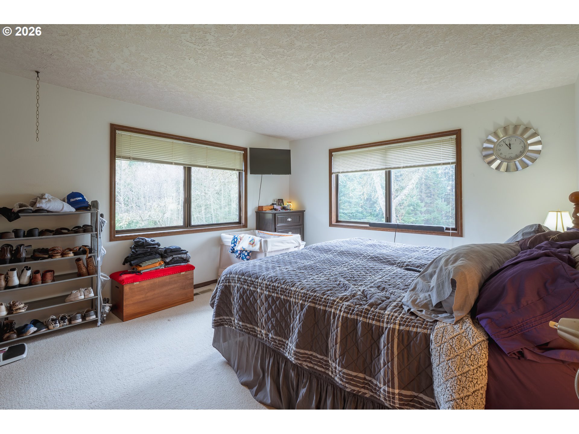 76382 Delena Mayger Road Rainier, OR 97048 - Photo 28 of 36 a bedroom with a bed and a large window