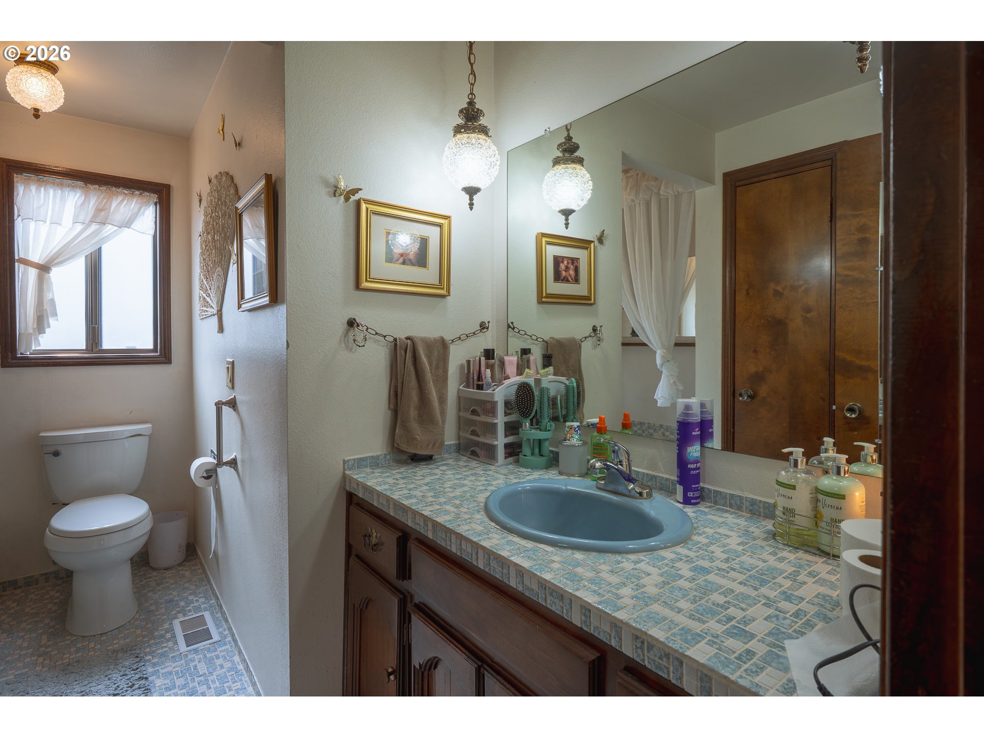 76382 Delena Mayger Road Rainier, OR 97048 - Photo 29 of 36 a bathroom with a sink and a mirror