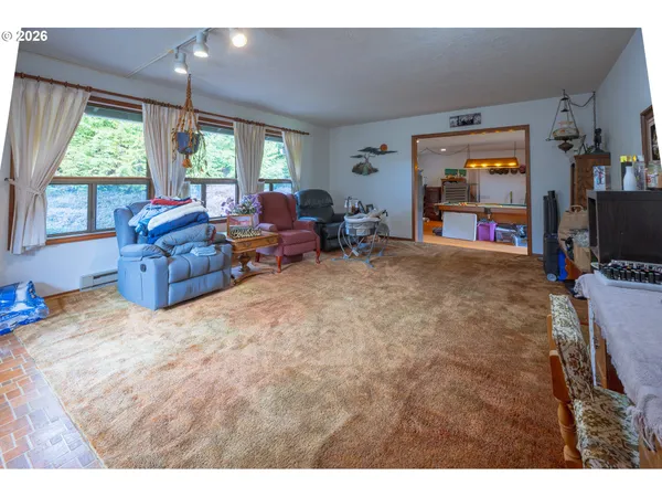 a room with furniture and pool table
