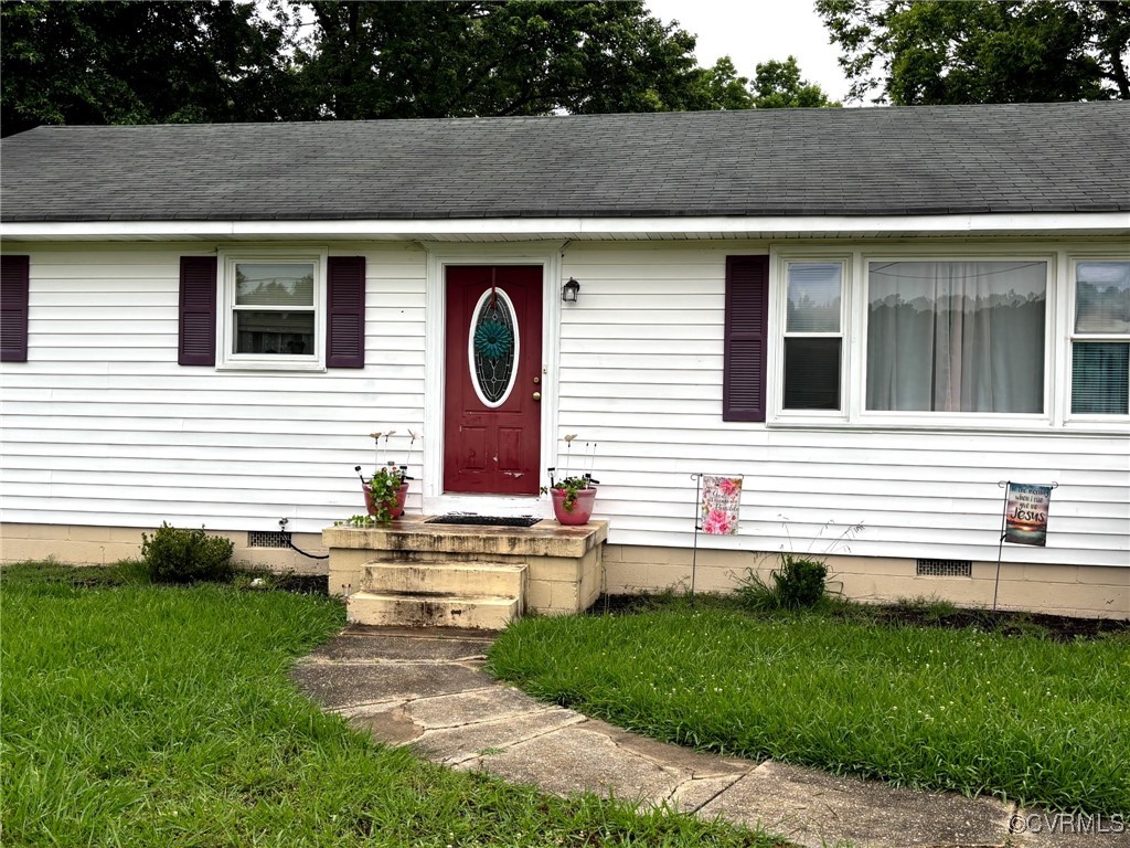 View of front facade featuring crawl space and a s