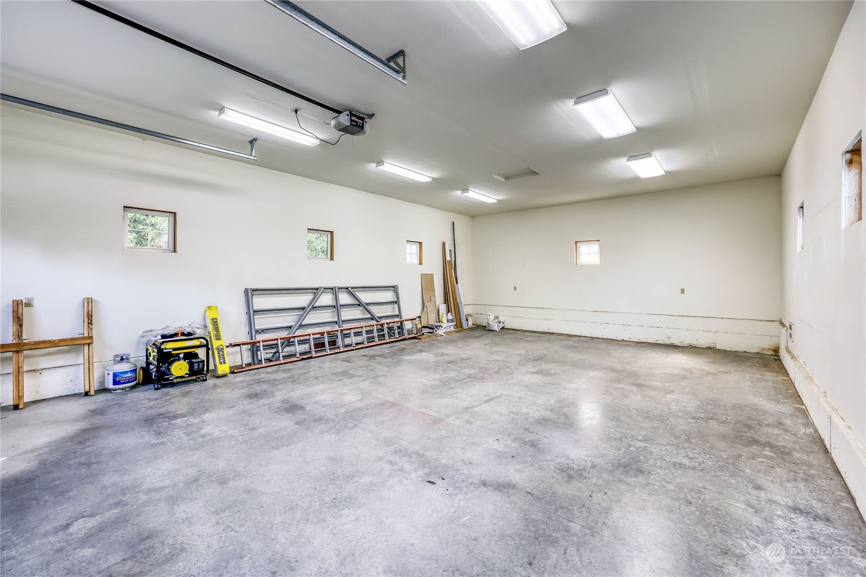 5701 Northeast Gunderson Road Poulsbo, WA 98370 - Photo 18 of 40 an empty room with toys and natural light