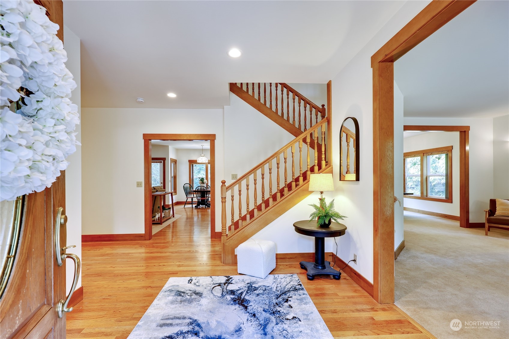 5701 Northeast Gunderson Road Poulsbo, WA 98370 - Photo 3 of 40 a view of entryway and hall with wooden floor