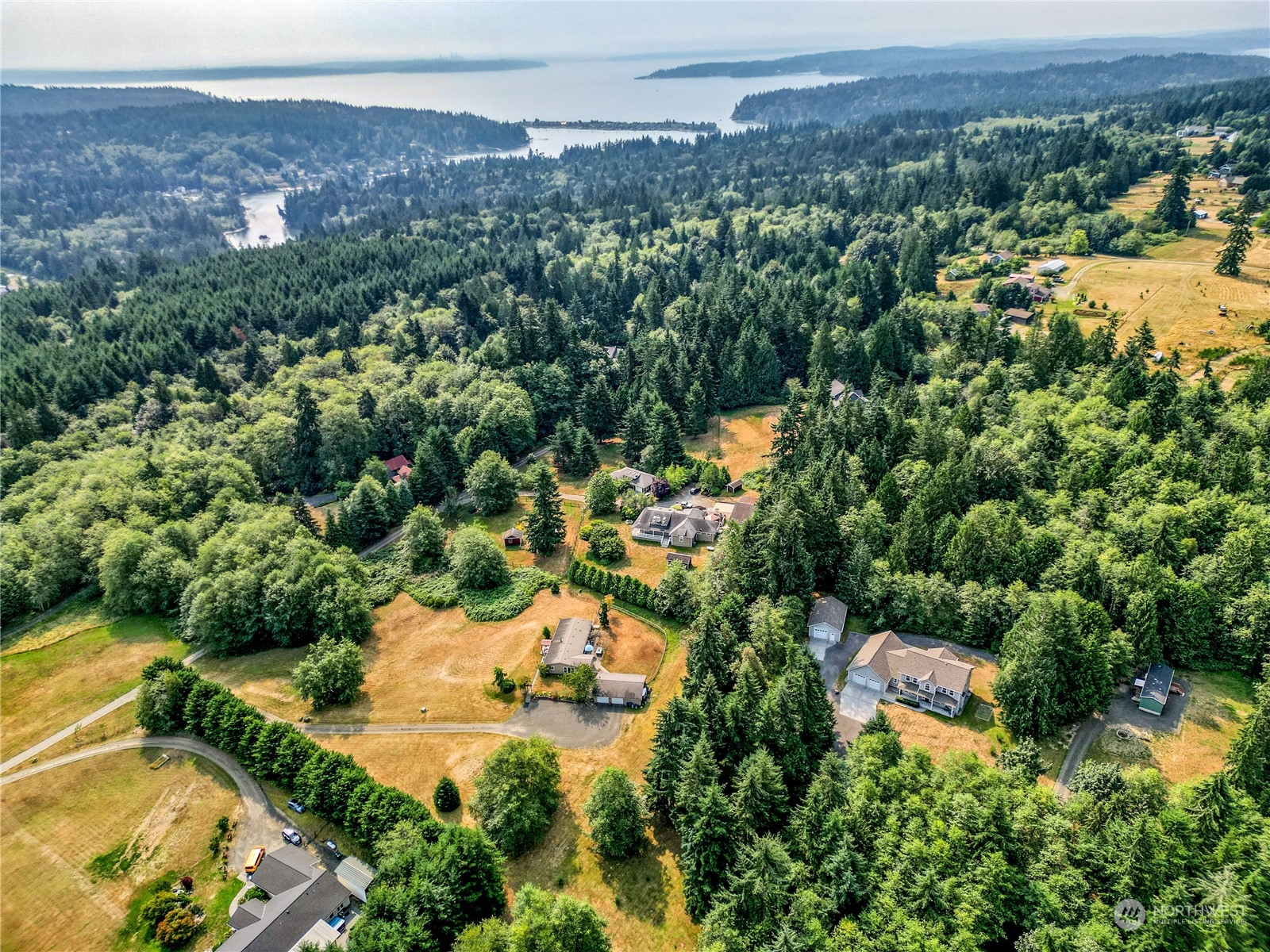 5701 Northeast Gunderson Road Poulsbo, WA 98370 - Photo 38 of 40 an aerial view of a house with a garden
