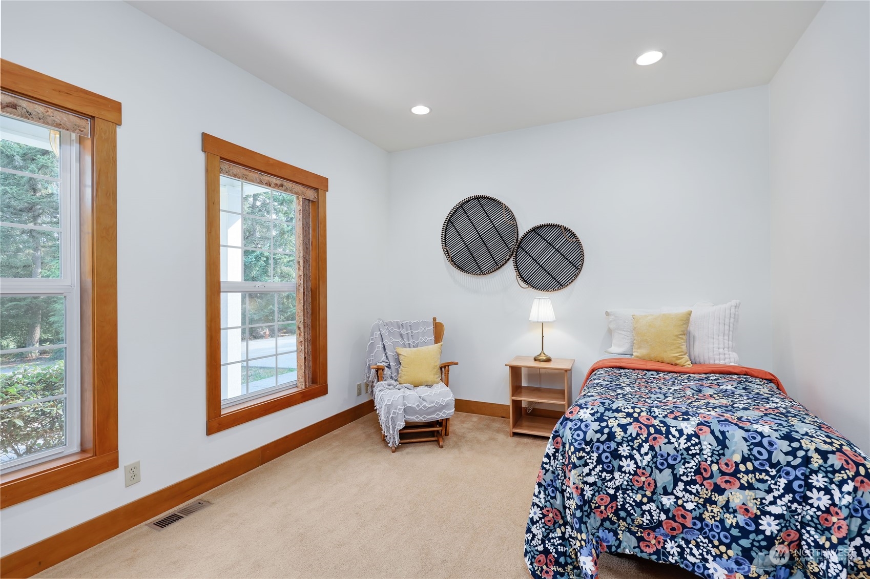 5701 Northeast Gunderson Road Poulsbo, WA 98370 - Photo 8 of 40 a bedroom with bed and a window