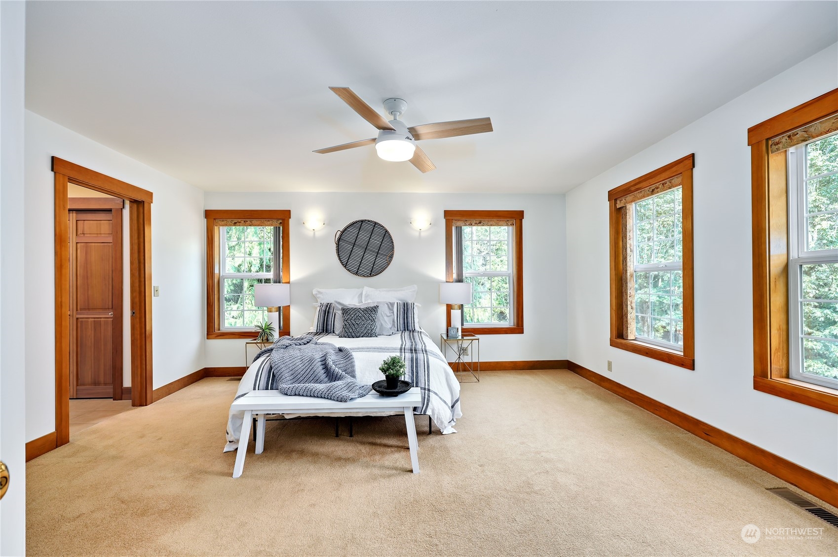 5701 Northeast Gunderson Road Poulsbo, WA 98370 - Photo 9 of 40 a room with a bed and a large window