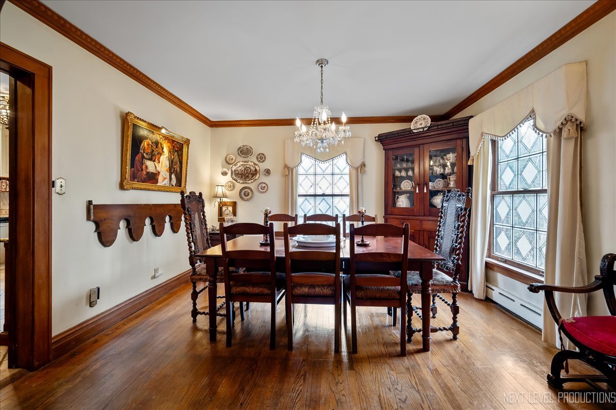 640 Anderson Boulevard Geneva, IL 60134 - Photo 11 of 41 a view of a dining room with furniture window and wooden floor