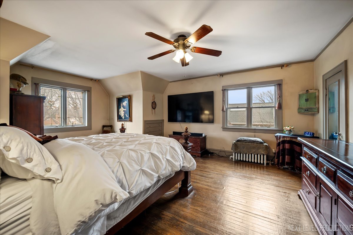 640 Anderson Boulevard Geneva, IL 60134 - Photo 22 of 41 a bed room with a bed and a television