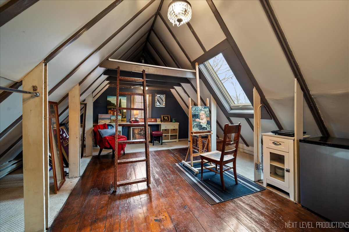 640 Anderson Boulevard Geneva, IL 60134 - Photo 30 of 41 a view of an empty room with wooden floor