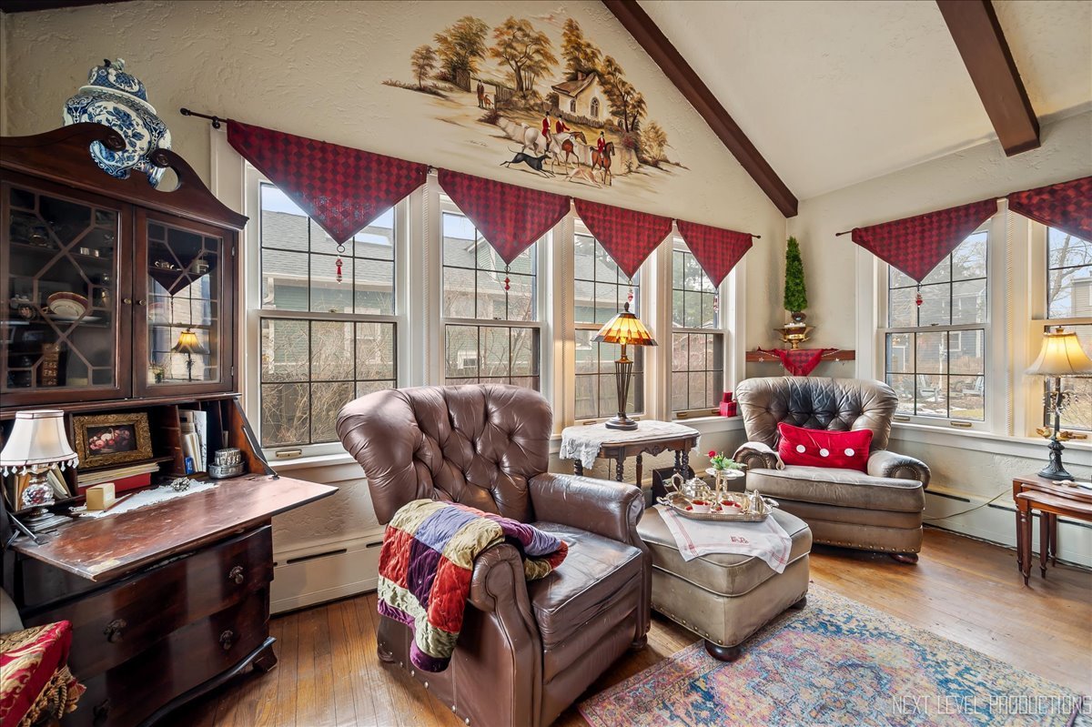640 Anderson Boulevard Geneva, IL 60134 - Photo 7 of 41 a living room with furniture and a flat screen tv